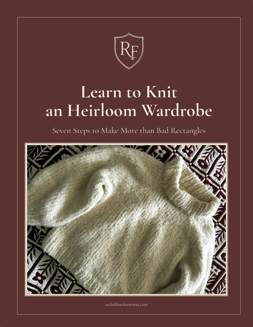 Cover of Learn to Knit an Heirloom Wardrobe — a cream hand-knit sweater laid on a block-printed quilt